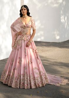 Soft pink raw silk lehenga set with an organza dupatta. Lehenga has silver and pearl zardosi embroidery. Luxury Raw Silk Lehenga With Floral Embroidery, Luxury Zari Work Lehenga For Festival, Luxury Pink Choli With Intricate Embroidery, Luxury Pink Choli With Pearl Embroidery, Luxury Pink Choli With Motifs, Luxury Pink Choli With Floral Embroidery, Luxury Designer Organza Lehenga, Luxury Sequined Dola Silk Lehenga, Luxury Pink Blouse Piece With Dupatta