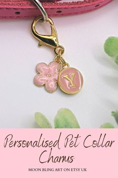 Personalised initial pet charms. Enamel letter charms in pink. With pink enamel flower charm and split rings or clasp for easy assemble to collars. Perfect gift for girly dog mums, cat mums, new kittens and puppies, can be an addition to keychains, or pet harness, cat and dog collars Pet Collar Charms