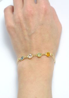 "Mother bracelet Family bracelet Grandma bracelet Birthstone bracelet Personalized bracelet Personalized birthstone bracelet Bridesmaid Personalized birthstone bracelet This gold bracelet is so delicate and chick. Personalize it for yourself with your or your family's birthstone/s or make it as a gift for your mother, sister, grandma or any loved ones. Details: - Gold filled double cable chain chose your length - 8mm gold plated swarovski birthstone ( chose the # of stones) Ordering : ~ Choose b Cheap Adjustable Birthstone Bracelets, Cheap May Birthstone Bracelets As Gifts, Cheap Birthstone Bracelet Jewelry, Affordable Adjustable Birthstone Charm Bracelet, Nana Bracelet, Mother Bracelet, Family Bracelet, Grandma Bracelet, Family Bracelets