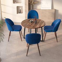 a dining room table with blue chairs around it