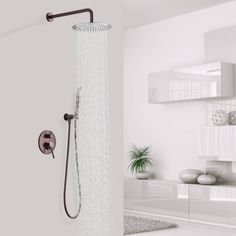 an open shower head in a white bathroom