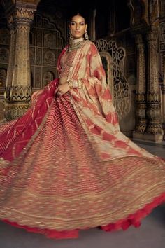 Red can can attached lehenga featuring dabka and dori embroidered vine motifs in chevron pattern, highlighted by beads, sequins, crystals and scallop hem. Comes with padded bead tasselled blouse, shoulder dupatta 1, scallop patterned kiran lined dupatta 2 and scalloped belt. - Aza Fashions Red Bridal Lehenga, Silk Lehenga Choli, Tassel Blouse, Raw Silk Lehenga, Anamika Khanna, Diana Penty, Bridal Lehenga Red, Embellished Belt, Red Lehenga