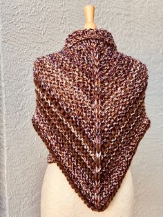 The shawl is made from a 40% merino wool and 60% acrylic yarn. The wing span is approximately: XS-S - 64-66 inches, M-L - 72-74 inches, XL-1x - 80-82 inches. The knitted fabric is flexible and stretchy. CARE: Wash in cold water, gentle cycle, lay flat to dry. All items are made from a high quality yarn in a pet and smoke free home studio. Knit Play Love is a one-woman operation. I design, create, take pictures, package, and ship every item in my shop. I also try to respond to all your emails and One Size Hand Knitted Brown Knitting Pattern, One Size Brown Knitted Scarves, Brown Hand Knitted One Size Knitting Pattern, One Size Brown Hand Knitted Pattern, Brown Crochet Shawl For Fall, Brown Knitting Pattern With Knit Fabrication, Fall Crochet Brown Shawl, Hand Knitted Acrylic Scarves For Fall, Hand Knitted Brown Poncho For Winter