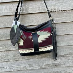 "This is the perfect bag!! Made with Pendleton wool and a perfect black distressed leather, this bag is the bag that every gal neeeeeds! The back leather patch pocket is perfect for your keys and phone! The back of the bag you will receive has black leather on the back and for the back pocket. For the interior, I used a cotton fabric that I interfaced for durability. The interior features 2 slip pockets and a zipper pocket. A zipper closes the bag. The strap is adjustable for cross body/ shoulde Fall Leather Trim Crossbody Shoulder Bag, Fall Shoulder Bag With Leather Trim, Crossbody Shape, Everyday Fall Bags With Leather Trim, Fall Leather Lining Hobo Shoulder Bag, Fall Leather Hobo Bag, Fall Leather Trim Satchel Shoulder Bag, Leather Tote Shoulder Bag With Leather Patch, Leather Hobo Bag For Fall, Wool Travel Bags For Fall