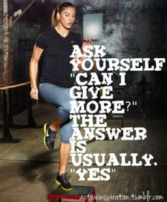 a woman in black shirt and blue pants doing a trick on a skateboard with words above her