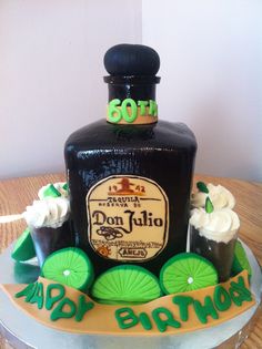 a birthday cake made to look like a bottle of liquor