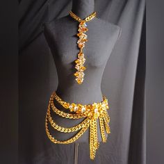 Handmade Layered Linked Chain Embellished Belt With Matching Necklace. (Adjustable) Gold Adjustable Body Chain For Party, Gold Body Chain With Adjustable Chain For Party, Gold Jeweled Costume Chain Necklace, Gold Adjustable Chain Costume Necklace, Gold Rhinestone Necklaces For Festival, Yellow Rhinestone Jewelry For Party, Gold Rhinestone Body Chain For Evening, Glamorous Gold Body Chain With Adjustable Chain, Multi-strand Chain Layered Necklace For Costume Jewelry