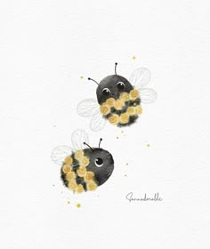 two bees with yellow flowers on their backs