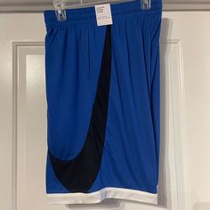 New With Tags Attached, Size: Xl, Color: Game Royal Blue. These Nike Dri-Fit Men's Basketball Shorts Have A Light, Loose Feel With Sweat-Wicking Technology To Keep You Dry. Dri-Fit Technology Wicks Sweat To Help You Stay Dry And Comfortable Knit Fabric Feels Soft And Lightweight Large Swoosh Logo Is Cut From Fabric And Stitched Into The Body 2-Pocket 10-In. Inseam Sporty Blue Shorts For Basketball, Nike Blue Athletic Shorts, Nike Sweat Shorts, Sporty Bottoms With Built-in Shorts For Basketball, Moisture-wicking Basketball Athletic Shorts, Athleisure Moisture-wicking Basketball Shorts, Blue Moisture-wicking Athletic Shorts For Streetwear, Nike Basketball Shorts, Nike Retro