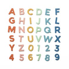 the letters and numbers are made out of colored plasticine materials on a white background