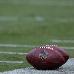 a football sitting on top of a field