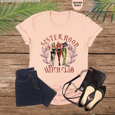 Sisterhood Witch Club Shirt, Halloween Girls Shirt, Gothic Shirt, Spooky Sisters Shirt, Spooky Season Shirt, Witchy Shirts, Halloween Gifts Welcome to our shop! We're excited to have you here. Before you start shopping, please take a moment to read through these important details: Placing Your Order: ● Read Carefully: Please take your time to go through all the information provided in the description. ● Customization: If you need any changes to our designs, let us know before you order. ● Prefer Short Sleeve Tops With Character Print For Costume Party, Character Print Short Sleeve Top For Costume Party, Character Print Top For Costume Party With Short Sleeves, Cotton Crew Neck Top For Costume Party, Halloween Character Print Pink Top, Casual Top With Character Print For Costume Party, Cotton Tops With Character Print For Costume Party, Cotton Tops With Letter Print For Costume Party, Spooky Cotton Top For Costume Party