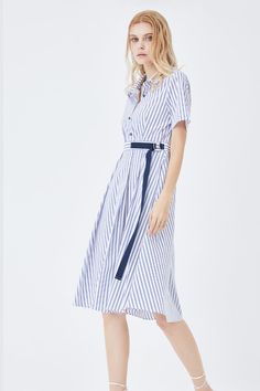 Mid-length dress with a narrow waist can be worn in almost every season, worn alone or worn inside. Gender: Woman Season: Spring / Summer Style: Commuting Type: A-line dress Neck Type: Lapel Sleeve Type: Shirt Sleeve Sleeve Length: Short Sleeve Waist type: high waist Thickness Index: Moderate Type index: fit Elasticity index: micro-bomb Material: 50% cotton, 45% cotton, 5% spandex Pattern: Stripes Size Bust Waist Cuff Length Sleeve Shoulder S 91cm 72cm 31cm 103cm 21.5cm 37cm M 95cm 76cm 32cm 104 Classic A-line Cotton Shirt Dress, Classic Summer A-line Shirt Dress, Formal A-line Cotton Shirt Dress, Classic Striped Shirt Dress, Spring Striped Shirt Dress For Formal Occasions, Striped Shirt Dress For Spring Formal, Striped Shirt Dress For Spring Formal Occasions, Striped Shirt Dress For Spring Formal Events, Casual Button-up Office Dress