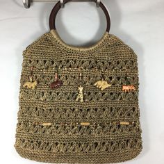 St Johns Bay Woven Straw Handbag With Animal Bead Detail. Leather Round Handles. Inside Zipper Pocket. Brand New Vacation Beaded Beige Shoulder Bag, Summer Beaded Crochet Bag For Daily Use, Bohemian Beaded Crochet Bag For Summer, Beige Beaded Crochet Bag For Beach, Summer Beaded Crochet Bag For Everyday Use, Beaded Crochet Rectangular Bag For Beach, Beaded Crochet Bag For Summer, Summer Beaded Crochet Bag, Bohemian Beaded Crochet Bag For The Beach