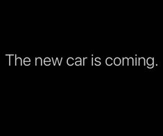 the new car is coming text on a black background