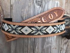 Handmade Beaded Leather Belt. Made to your specifications, the colors that you would like and the pattern that you would like. You can choose width, bead color, leather color, and pattern in the leather. You can add a brand, a name, or your initials. You can totally design your belt or you can leave Beaded Headstall, Beaded Belts Patterns, Beaded Belts, Leather Inlay, Beaded Hat Bands, Custom Leather Belts, Beaded Hat, Cowboy Belt, Custom Belt