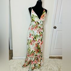 Floral Maxi Dress With Cris Cross Spaghetti Strap Back.. Floral Print Spaghetti Strap Dress For Summer Parties, Spaghetti Strap Floral Dress For Summer Parties, Tropical Spaghetti Straps Dresses For Party, Beach Season Tropical Print Maxi Dress With Spaghetti Straps, Cami Dresses For Beach Season Vacation, Cami Dress For Beach Vacation, Vacation Maxi Dress With Adjustable Straps, Spaghetti Strap Maxi Dress With Tropical Print For Vacation, Spring Tropical Maxi Dress With Spaghetti Straps