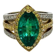 Beautiful 4.75 ct. emerald marquise with good quality white diamond rounds.  Handmade in 18k white and yellow gold.  Ring size 7. Round Diamond Ring, Diamond Cocktail Rings, Modern Ring, Emerald Stone, Princess Diamond, Yellow Gold Ring, Baguette Diamond, Princess Cut Diamonds, Emerald Diamond