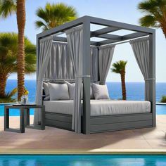 a canopy bed sitting next to a swimming pool with palm trees in the foreground