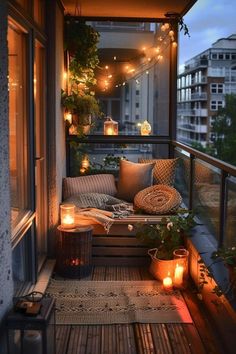 a balcony with lights and pillows on it