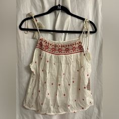 Nwt Free People Embroidered Tank Top With Tie Tasseled Straps And Cinched Elastic Waist. Size Large. White Bohemian Embroidered Tank Top, Free People Double Date Tank, Bohemian V-neck Tank Top For Beach, Embroidered Tank Top, Red Bohemian Embroidered V-neck Top, Free People Tank, Embroidered Tank, Free People T-shirts & Tank Tops, Free People Tops