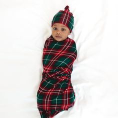 Infant laying on a blanket swaddled in a Fireside Plaid Swaddle & Hat Set Family Holiday Cards, Holiday Baby, Baby Gown, Box Making, Hat Set, Holiday Style, Fall Favorites, Family Holiday, Burp Cloths