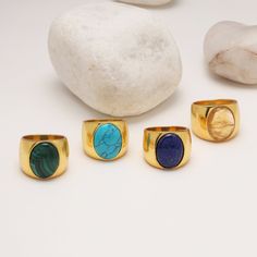 Bohemian statement ring in various gemstone options - Turquoise, Citrine, Malachite and Lapis Lazuli. Bold chunky ring in gold plating with Oval shape gemstone Cabochon Set in top notch flush Bezel. Suitable for men and women. Durable gold plating, anti-tarnish, non-allergic. Gold Turquoise Ring With Large Stone As Gift, Bohemian Gold Rings With Large Stone, Bohemian Gold Rings With Natural Stones, Gold Bohemian Rings With Natural Stones, Jewelry Board, Chunky Ring, Gold Statement Ring, Gold Gemstone Ring, Ringe Gold