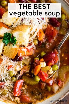 a white bowl filled with soup and vegetables