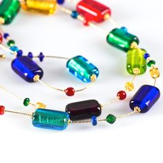 "PRIMAVERA Long necklace multicolor beads Beaded necklace featuring \"sommerso\" silver leaf on glass of various colors. A handcrafted and unique Murano Glass jewel. Perfect piece of classic jewelry to complete your outfit with elegance and originality, or as a valued gift idea. Availability: made to order Shipment: in 2/3 weeks Length: 90 cm / 35\" Weight: 110 gr / 0,24 lb Trademark Of Origin Code: 065 Free shipping worldwide Handmade by one of our famous Murano glassmakers Item condition NEW W Multicolor Single Strand Glass Jewelry, Party Necklaces With Colorful Czech Glass Beads, Colorful Beads Long Necklace Gift, Colorful Beads Long Necklace As Gift, Multicolor Czech Glass Beaded Necklace For Parties, Multicolor Czech Glass Necklaces With Oval Beads, Multicolor Czech Glass Oval Bead Necklace, Multicolor Czech Glass Necklace With Oval Beads, Elegant Multicolor Beaded Necklaces With Spacer Beads