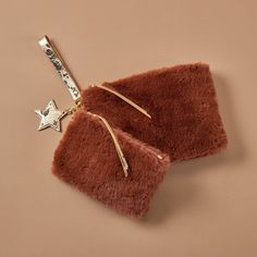 Cozy comfort and luxe leather come together in this faux fur wristlet pouch set. Wristlet Wallet Pouch Set in Faux Fur and Metallic Leather  Medium Brown Pouch Set in Medium Brown | Hobo® Wristlet Pouch, Wallet Pouch, Wristlet Wallet, Leather Wristlet, Come Together, Comforters Cozy, Medium Brown, Metallic Leather, Metallic Gold