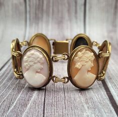 Collectible Yellow Gold Bracelets, Vintage Yellow Gold Cabochon Bracelets, Formal Oval Intaglio Bracelet, Antique Oval Cameo Bracelet, Oval Cameo Bracelet For Formal Occasions, Antique Cameo Jewelry, Cameo Bracelet, Antique Costume Jewelry, Antique Signs