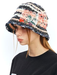 This is a comfortable and casual bucket hat that is made out of sturdy paper and cotton blend knit fabric. With a trendy and minimal design with bold stripe pattern and flower embroidery on the side, it gives a comfortable and casual look. - Paper yarn knit hat- Flower embellishments on the side- Bold stripe pattern Casual Striped Brimmed Bucket Hat, Striped Cotton Casual Hat, Casual Striped Bucket Hat With Curved Brim, Casual Cotton Yarn Sun Hat For Spring, Summer Striped Cotton Hat, Spring Cotton Beanie Hat, Casual Cotton Yarn Bucket Hat, Casual Striped Hats For Spring, Trendy Cotton Crochet Hat For Spring