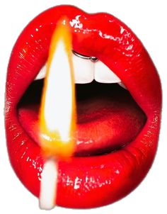 a red lip with a lit candle sticking out of it's mouth