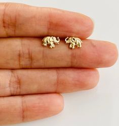 14K Solid Gold Elephant Earrings 14K Solid Gold Butterfly Closure      Size: 6mm x 8.5mm 14k Real Gold  SOLD AS A PAIR Nickel and lead free   Hypoallergenic Elephant Earrings Studs, Gold Elephant, Elephant Earrings, Dainty Studs, Pompano Beach, Earrings Dainty, Sell Gold, Gold Butterfly, Gold Earring