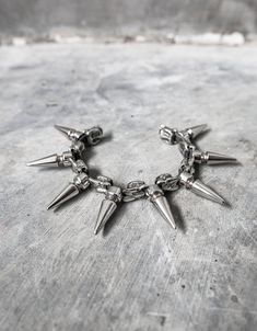 "Snake vertebrae cast in metal, set between large spikes.  Made with a unique flexible design, this spiked bracelet can flex to contour around your wrist.  Suitable for men and women, it fits between a 6.5\" on the tightest setting and 8\" on the loosest setting. If you need a different size range, specify when ordering. CURRENTLY MADE TO ORDER 3 WEEKS ETA" Snake Vertebrae, Leather Bra, Womens Bracelet, Metal Bracelet, Flexible Design, Metal Bracelets, Soft Black, Arm Band, Womens Bracelets