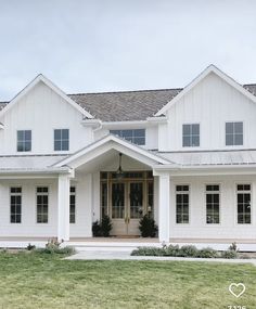 a large white house with lots of windows