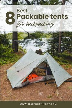 a tent pitched up in the woods with text overlay that reads 8 best packable tents for backpacking