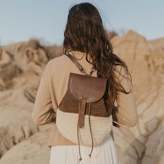 Ideal for any adventure and perfect for days spent on a plane or the beach, The Transito Backpack is a catch-all that’s up for everything you are. It has adjustable leather straps and a cinching leather top to secure your goods but still allow you convenient access. Handmade by skilled artisans and woven from an all-natural, plant-dyed cactus fiber and high-quality, vegetable-tanned leather. Style Notes Adjustable, removable straps Size: H 12" x L 9.5" x W 9" Large enough to hold all the essenti White Plants, Plant Dyes, Woman Weaving, Natural Plant, A Plane, Leather Style, Mini Backpack, Vegetable Tanned Leather, Summer Essentials