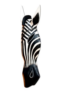 a ceramic zebra head is shown against a white background