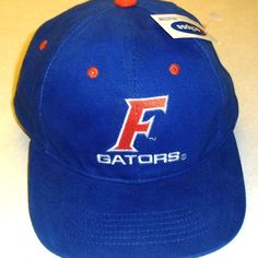 New With Tags Florida Gators 90s Vintage Mens Snapback Hat. The Front Has The Embroidered F Gators Logo On It. Made Of Cotton Material. It Is Made By Hmi Headwear. Adjustable Blue Baseball Cap For College, Blue Snapback Baseball Cap For College, Blue Baseball Cap For College During Baseball Season, Blue College Snapback Hat, College Blue Baseball Cap With Flat Bill, Collegiate Blue Hats For Streetwear, Blue Flat Bill Dad Hat For Baseball Season, Blue Retro Baseball Cap For Sports, Retro Blue Baseball Cap For Sports