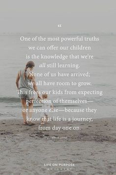 a woman standing on top of a beach next to the ocean with a quote about life