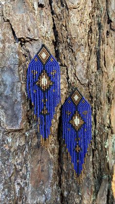 Complete your Bohemian chic outfit with these gorgeous indigo shoulder dusters and bring out your inner boho. Intricately handwoven with high quality Japanese glass beads and Japanese nylon thread for extra durability. Gorgeous colors Indigo blue, matte black, browns and golds.  *Hypoallergenic ear hooks, nickel and lead free and come with silicone backs to secure them. Please note that due to their handmade nature , each earring may differ slightly from the other. **Please care for your jewelry as you would with any valued piece of jewelry. To keep the materials in good condition, do not wear while swimming, bathing or heavily exercising.  Store your jewelry lying flat or hanging from a jewelry hanger. These earrings are "made to order". Please allow 1 to 3 business days processing time, Bohemian Chic Outfits, Buzzards Bay, Earrings Patterns, Beaded Earring, Jewelry Hanger, Earring Ideas, Chic Outfit, Ear Hook, Fringe Earrings