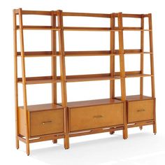 a wooden bookcase with drawers and shelves on the bottom, against a white background