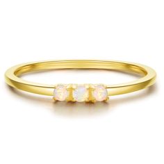 PRICES MAY VARY. This minimalist style white opal ring is perfect for every day wear and stacking. As the opals catch the light, they radiantly shine a rainbow of colors. Metal - The ring is made with solid sterling silver, 18k yellow gold plated for a lasting finish. Measurement- 1.5mm opal stones, 1.2mm skinny band. Gift - Packed in our brand jewelry pouch, ready to give to a loved one. It makes the most Perfect gift as an anniversary gift, or replacement for your diamond ring for an getaway. October Birthstone Ring, Slim Ring, Expensive Rings, October Birthstone Rings, White Opal Ring, Opal Studs, Ring Minimalist, October Birthstone, Cute Rings