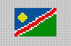 a cross stitch pattern with the colors of blue, green and red on it's diagonal curve