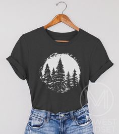 Pine Tree TShirt, Nature Lover, Forest Tee, Womens Camping, Hiking Gift, Tree Lover, Adventure TShirt, Camp Fire, Outdoors T-Shirt, Bellas Canvas 3001T: T-Shirt Sizing Please reference the size chart before selecting shirt size. Use one of your own t-shirts to measure the size and fit. Then compare with the size chart provided to ensure an accurate fit. T-Shirt Materials 100% combed and ring-spun cotton. Heather colors are 90% combed and ring-spun cotton, 10% polyester. Pre-shrunk fabric. Should Nature T-shirt, Nature Tshirt Design, Camping T Shirts Ideas, Camping Shirt Ideas, Nature Outfits Forests, Tree Tshirt Design, Cricket Shirt Ideas, Cool Shirt Designs Graphic Tees, Tshirts For Women Graphic Tees