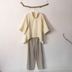 "Ready to wear cream linen blouses size M material: cream linen design: 3/4 sleeves chipao collar wavy hem measurements of the blouse : bust 40\" room (please allow extra room for your body measurements) blouse length 23\" front / 32\" back size M mix linen blouses are also available in the link below https://www.etsy.com/listing/714154694/ready-wear-mix-linen-blouses-size-m-wavy?ref=shop_home_active_9&frs=1" Cream Linen Blouse For Spring, Spring Cream Linen Blouse, Summer Beige Ramie Blouse, Cream Linen Long Sleeve Blouse, Cream Long Sleeve Linen Blouse, Long Sleeve Cream Linen Blouse, Spring Flax Colored Ramie Blouse, Spring Flax Ramie Blouse, Spring Flax-colored Ramie Blouse