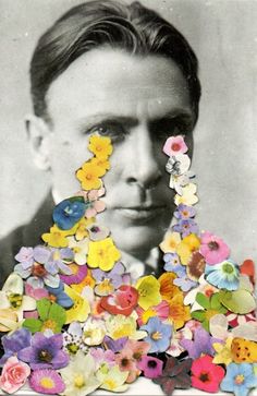 an old black and white photo with flowers in the shape of a man's face