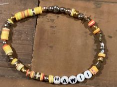 Feel like chilling in a tropical paradise? Try these Hawaii bracelets to transport you to warm beaches and tropical breezes. We are offering a $1 discount on these due to the spelling of Hawii (no a). Hawaii Bracelets, Tropical Paradise, Halloween Shopping, Feel Like, Hawaii, Paradise, Jewelry Bracelets, Accessory Gift, Beaded Bracelets