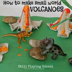 there are small toy dinosaurs and other toys on the green surface with text overlay that says how to make small world volcanos